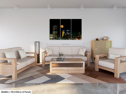a living room filled with furniture and a painting on the wall