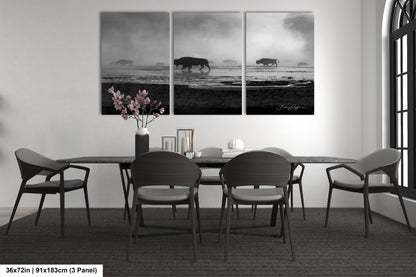 a black and white photo of a dining room table
