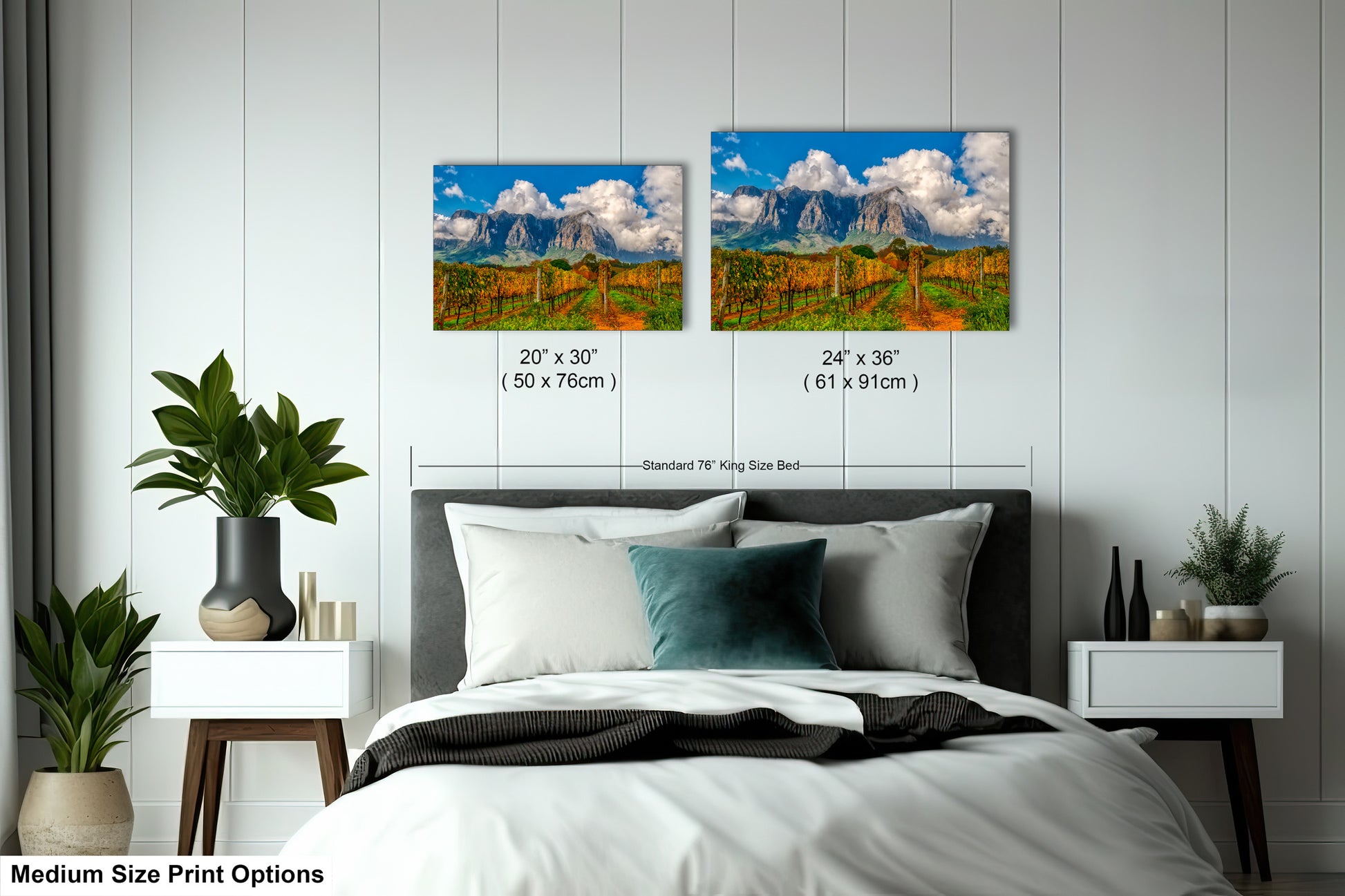 a bed room with a neatly made bed and two pictures on the wall