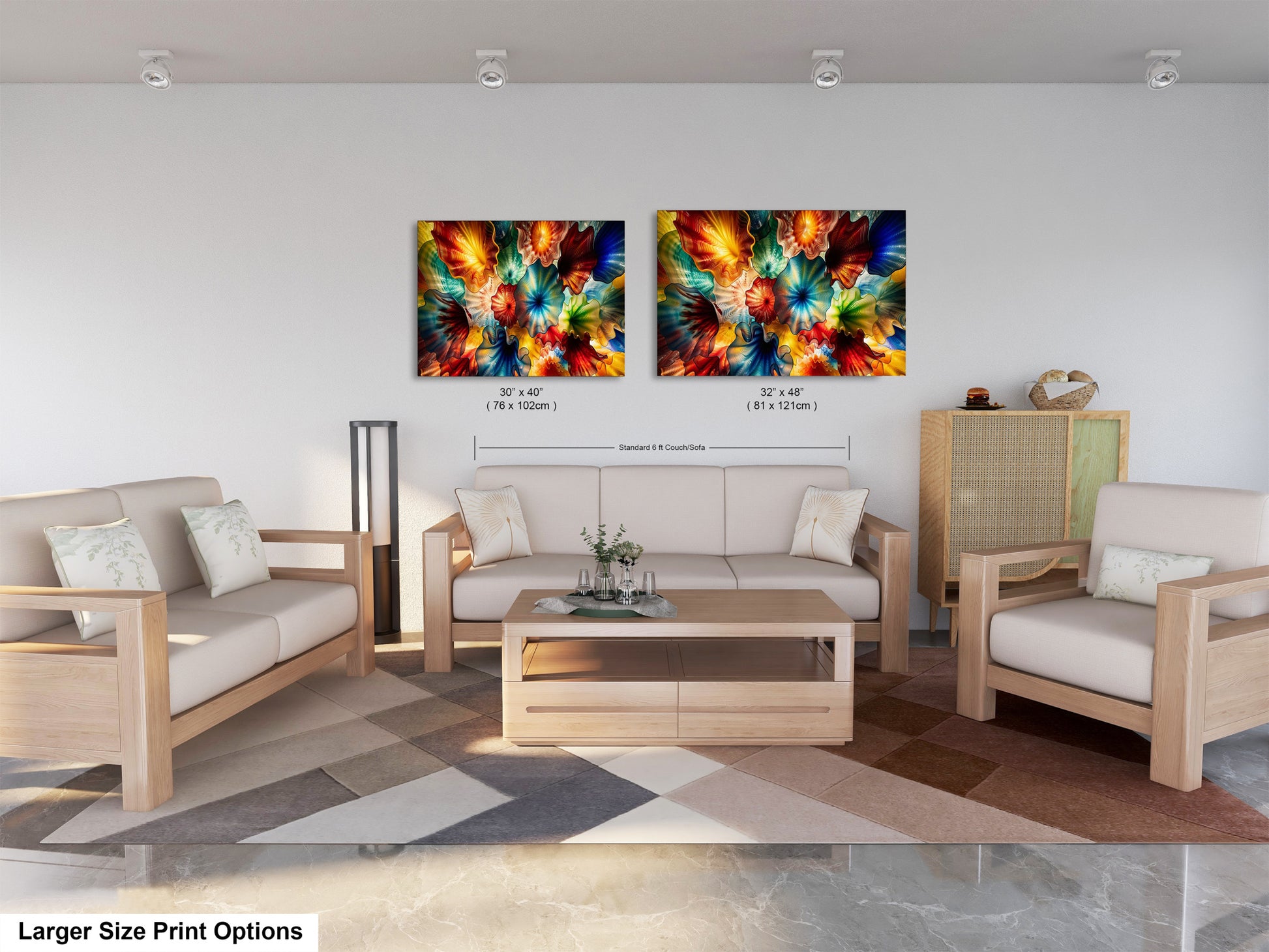 a modern living room with a white sofa, two chairs, and a coffee table. The room has a geometric patterned rug on the floor. Two large paintings of colorful flowers are hanging on the wall above the seating area.