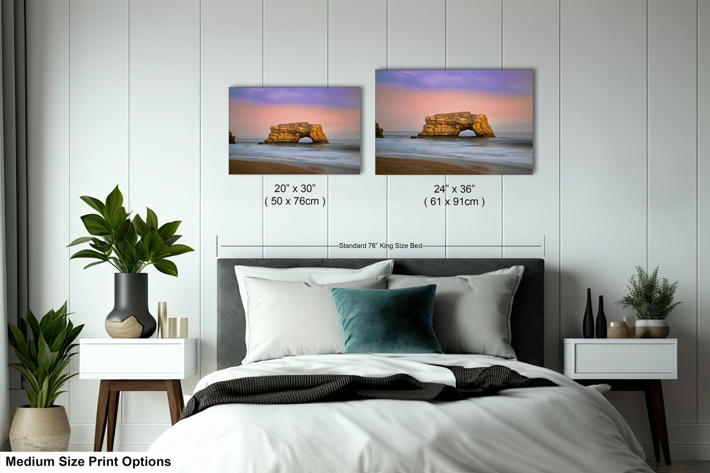 a bedroom with a bed and two pictures on the wall