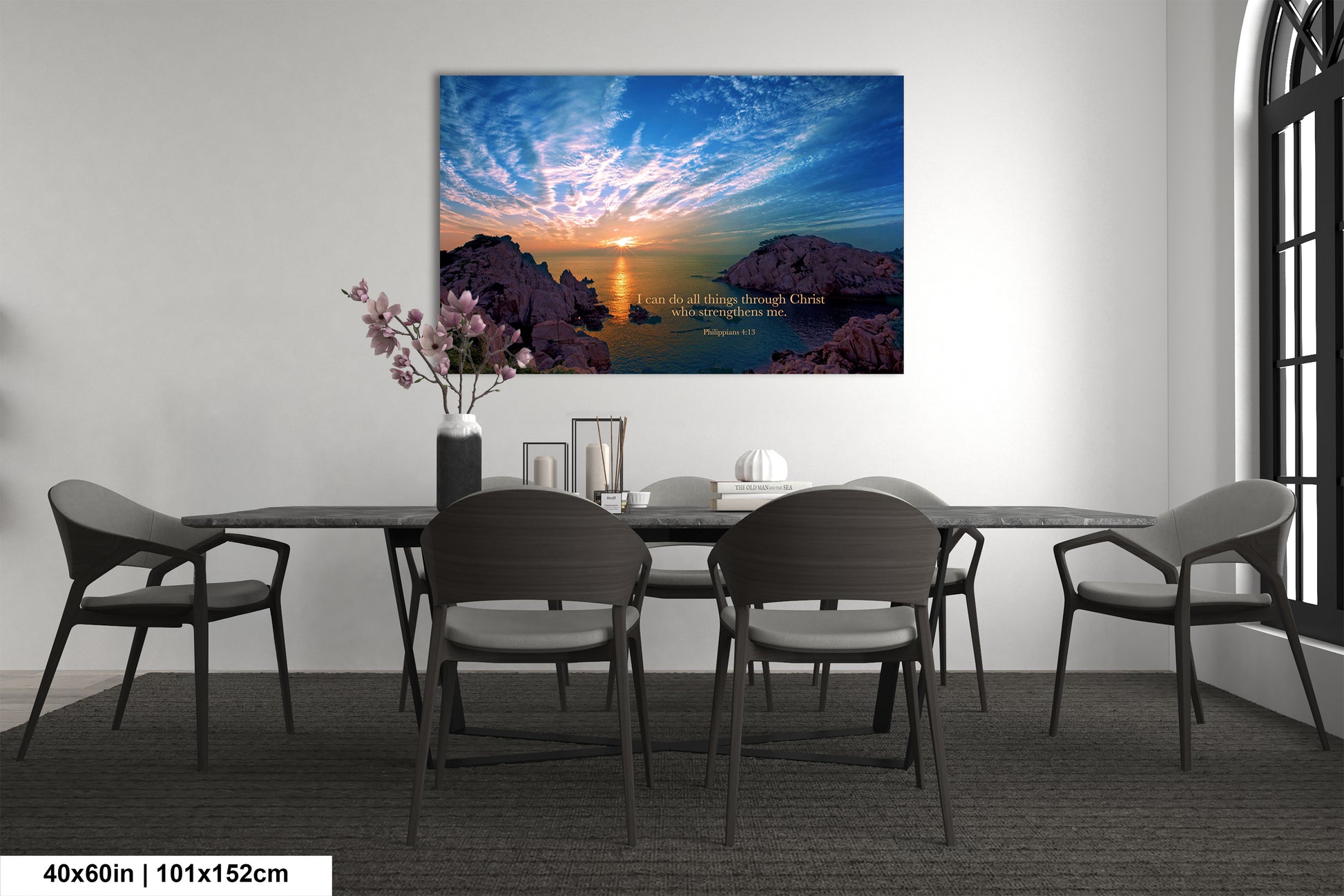 a dining room table with chairs and a painting on the wall