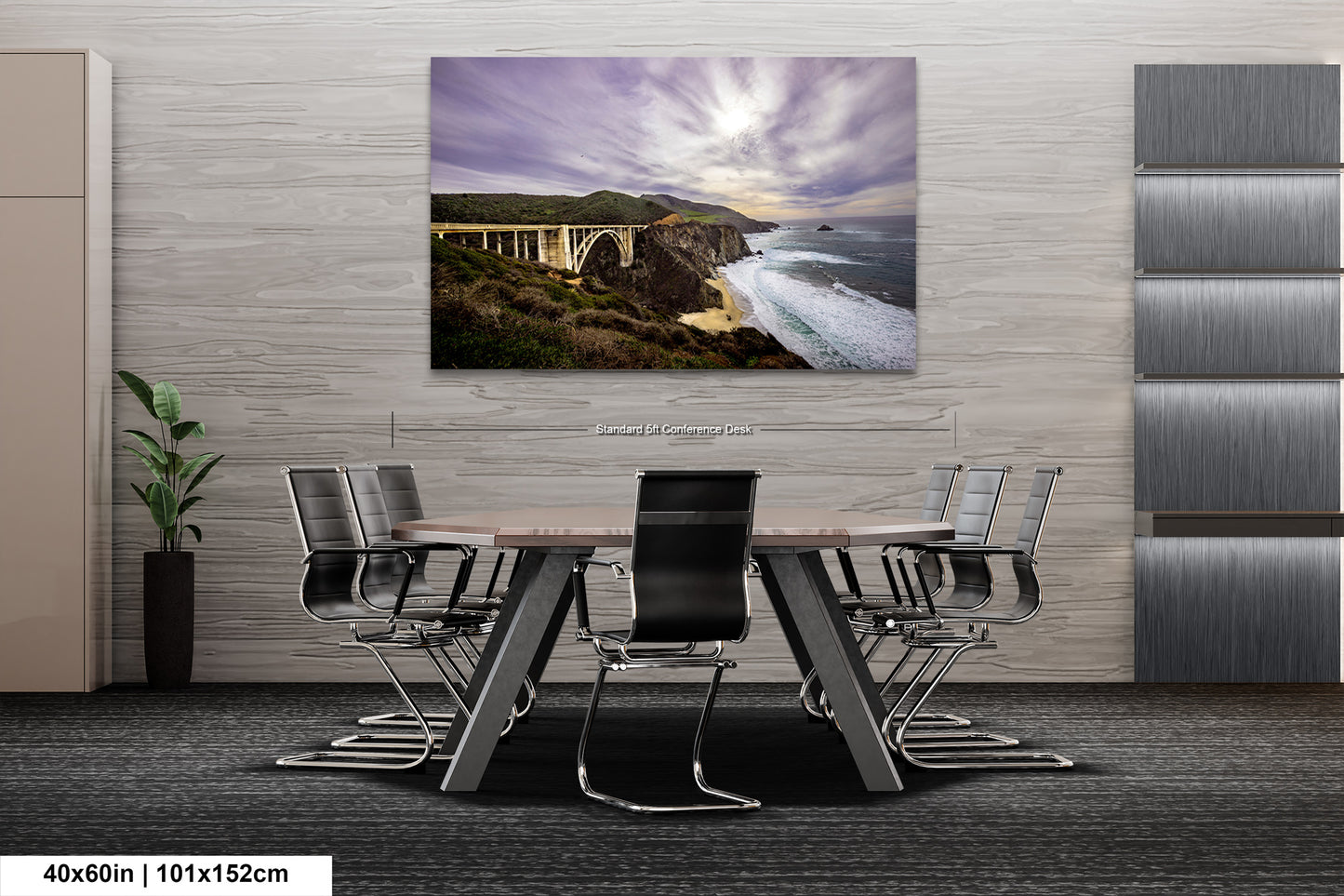 a dining room table with chairs and a painting on the wall