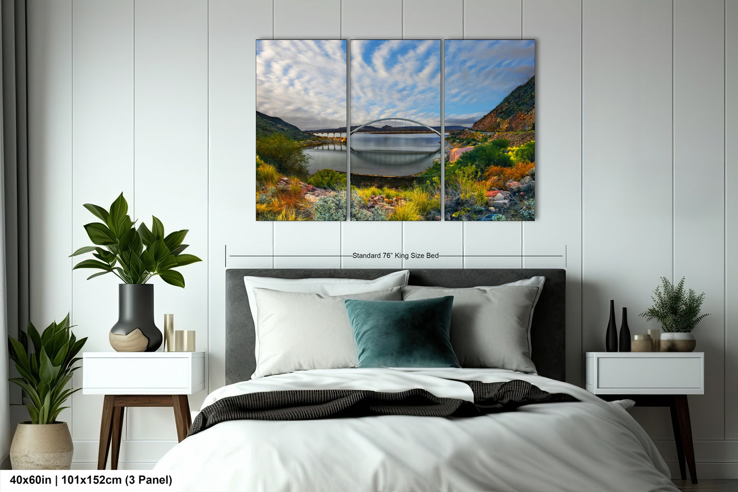a bedroom with a bed and a painting on the wall