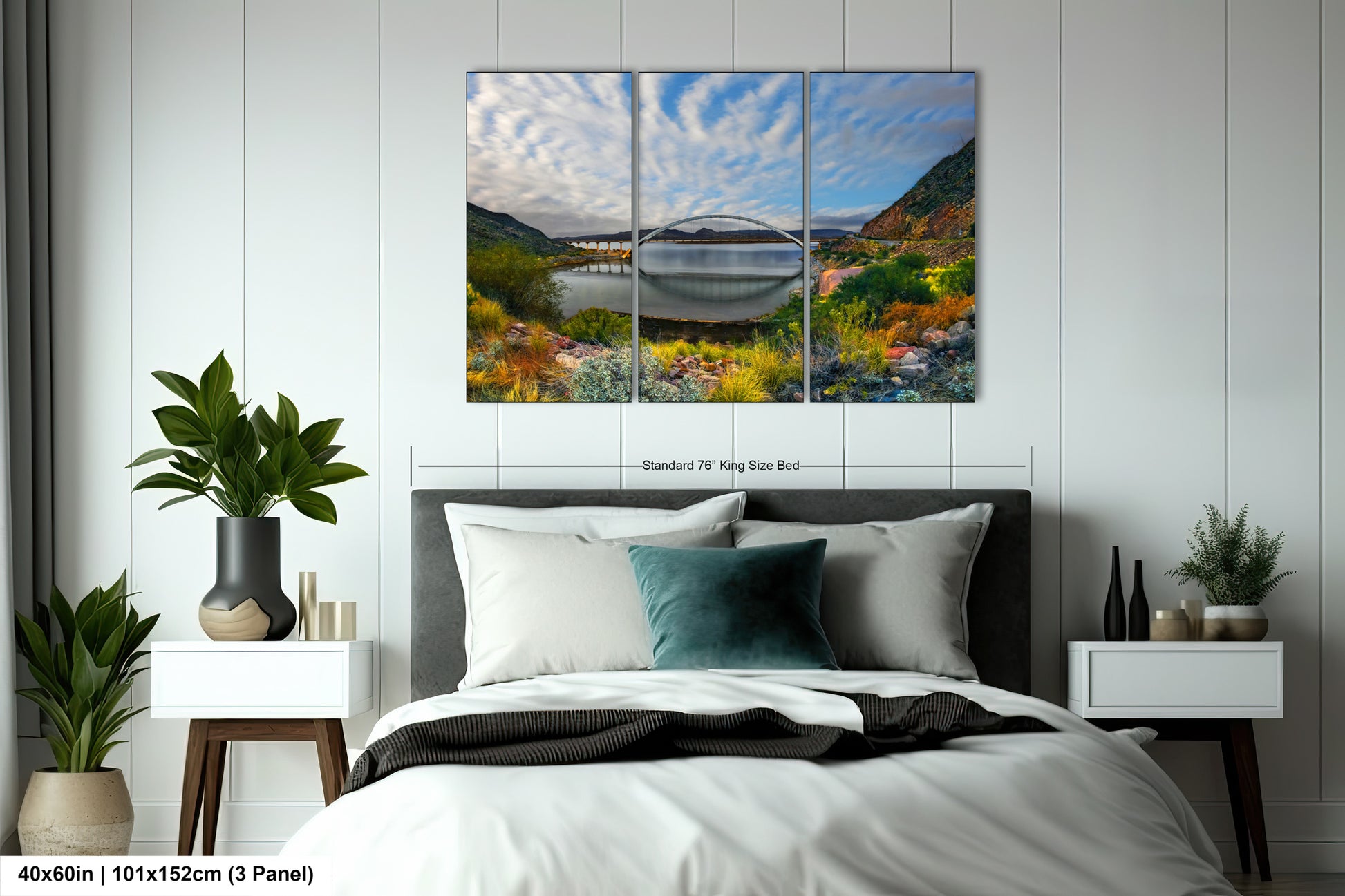 a bedroom with a bed and a painting on the wall