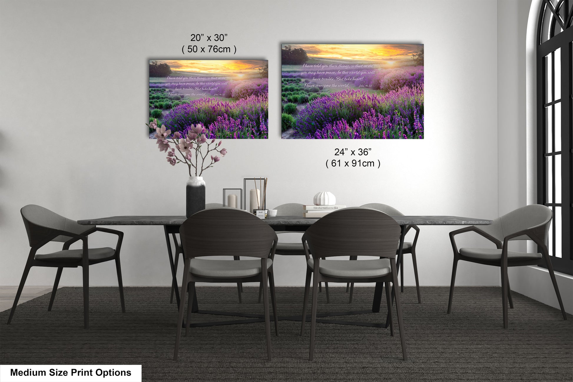 a dining room table with four chairs and a vase of flowers