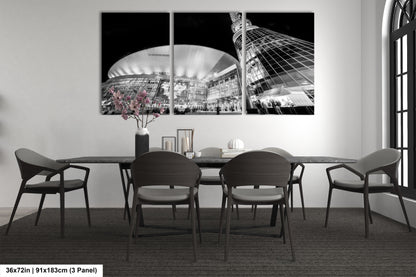 a black and white photo of a dining room