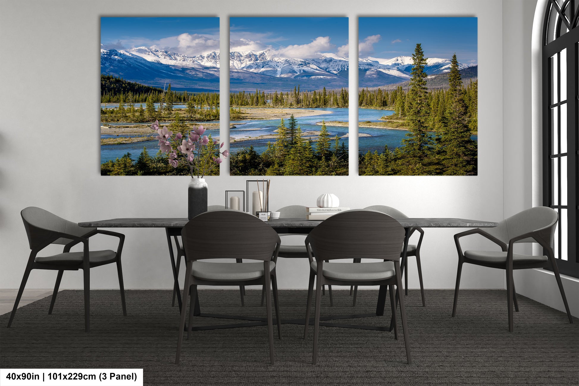 a dining room with a table and four chairs