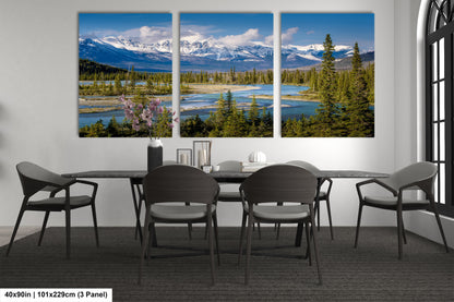 a dining room with a table and four chairs