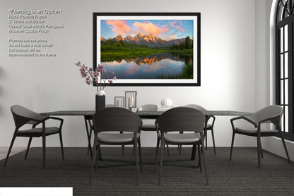 a dining room with a table and chairs