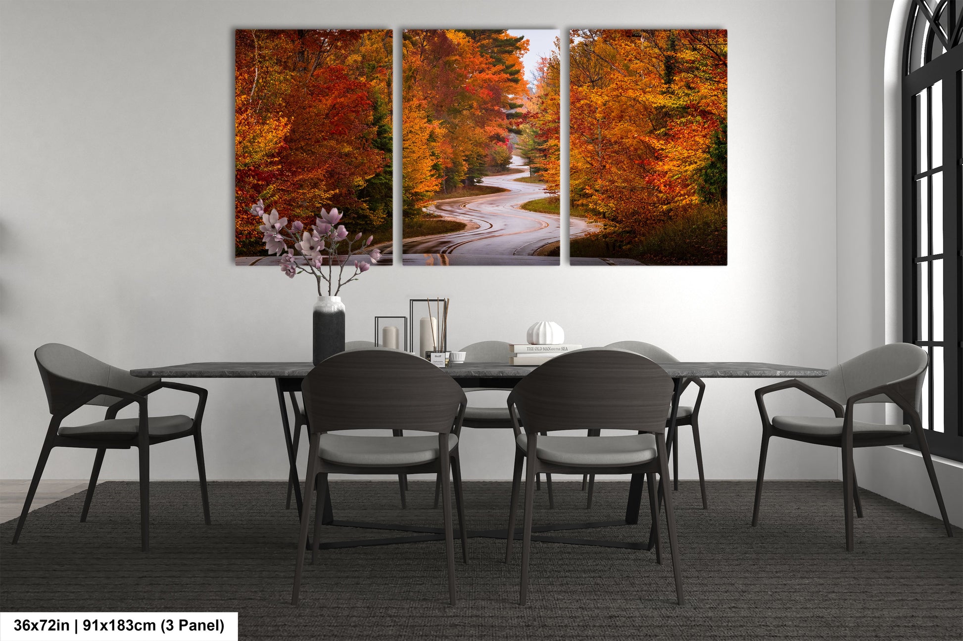 a dining room with a table and chairs