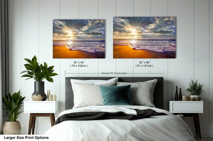 a bed with two pictures on the wall above it