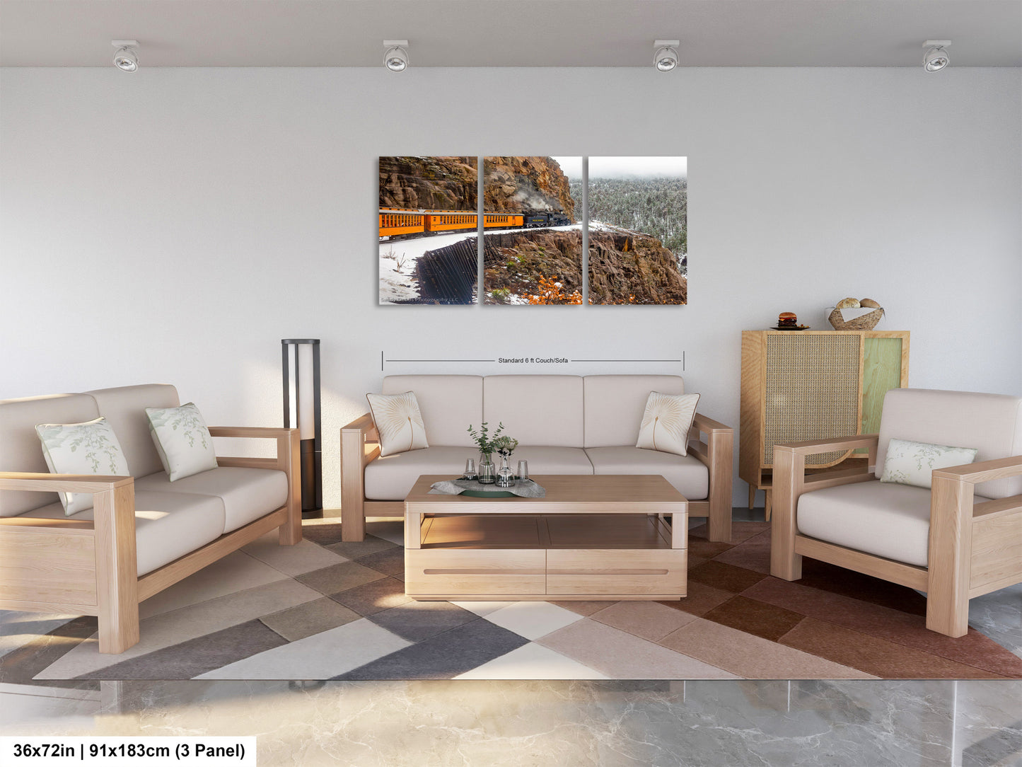 a living room filled with furniture and a painting on the wall