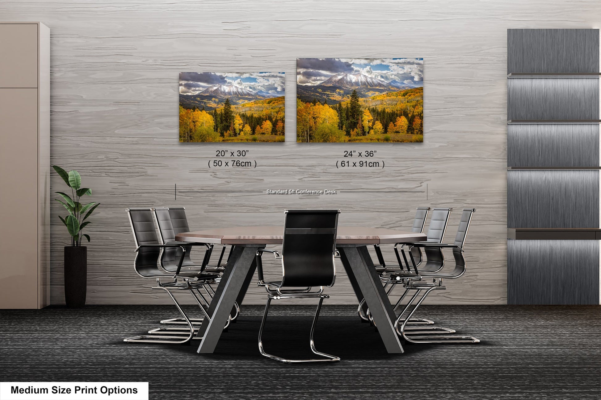 a dining room table with chairs and two pictures on the wall