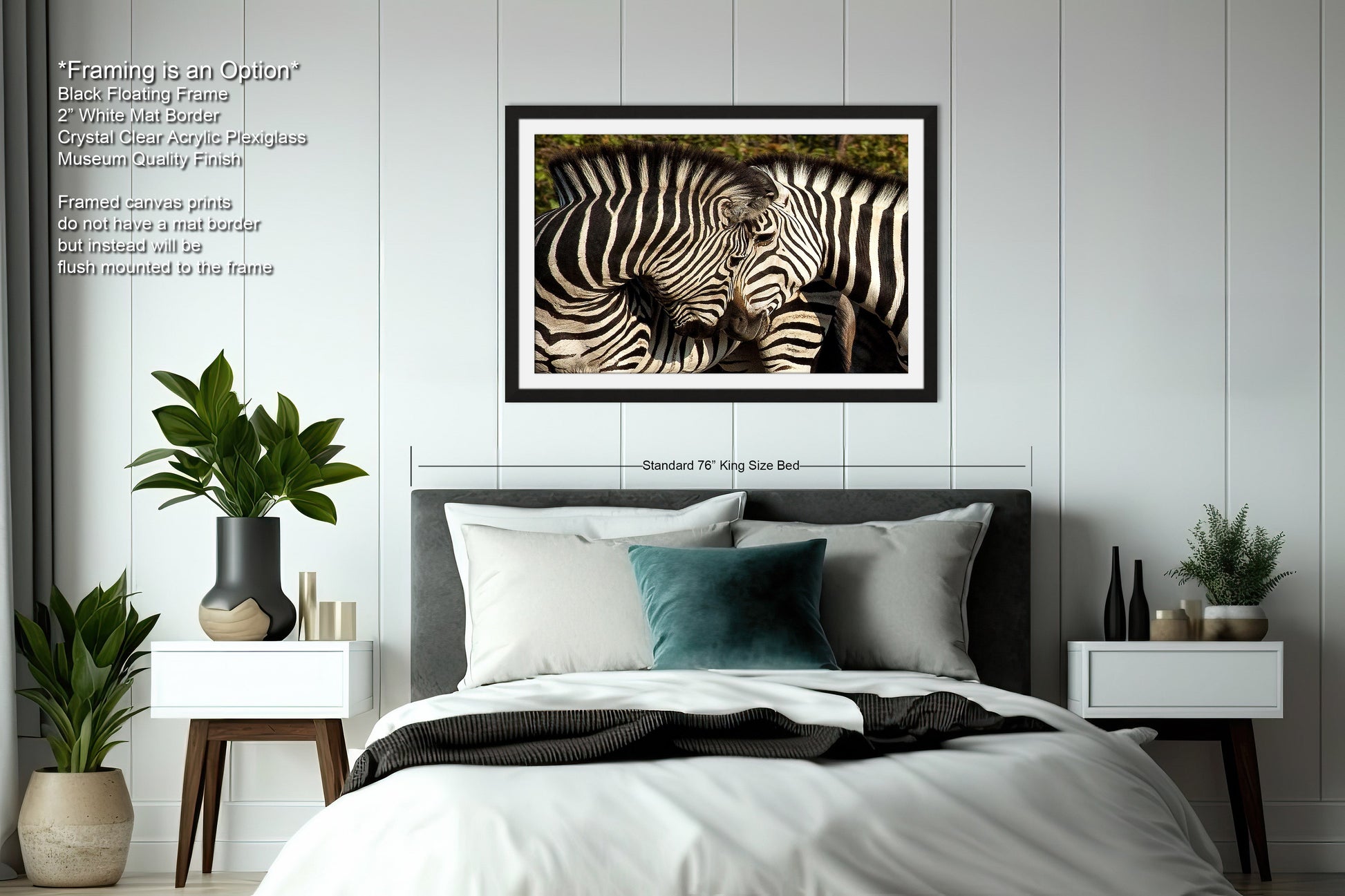 a picture of two zebras standing next to each other