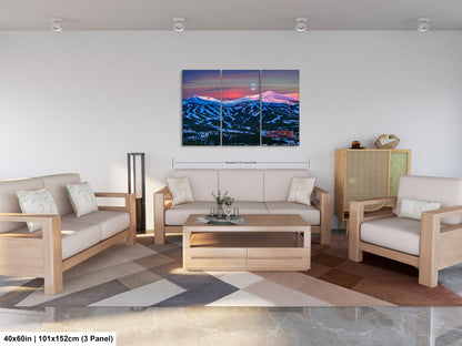 a living room filled with furniture and a painting on the wall