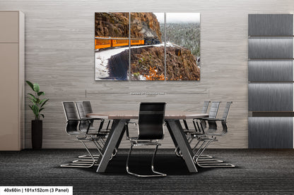 a dining room with a table and chairs