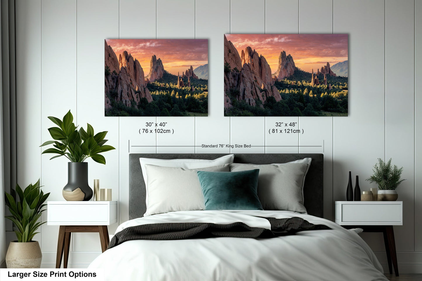 a bedroom with a bed and two pictures on the wall