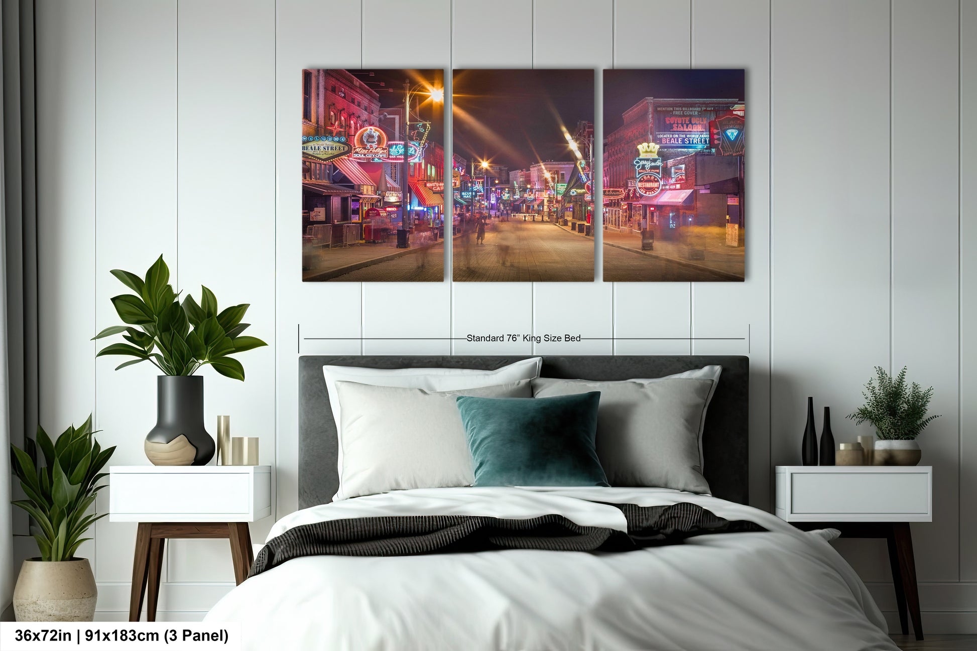 a bedroom with a bed and two paintings on the wall