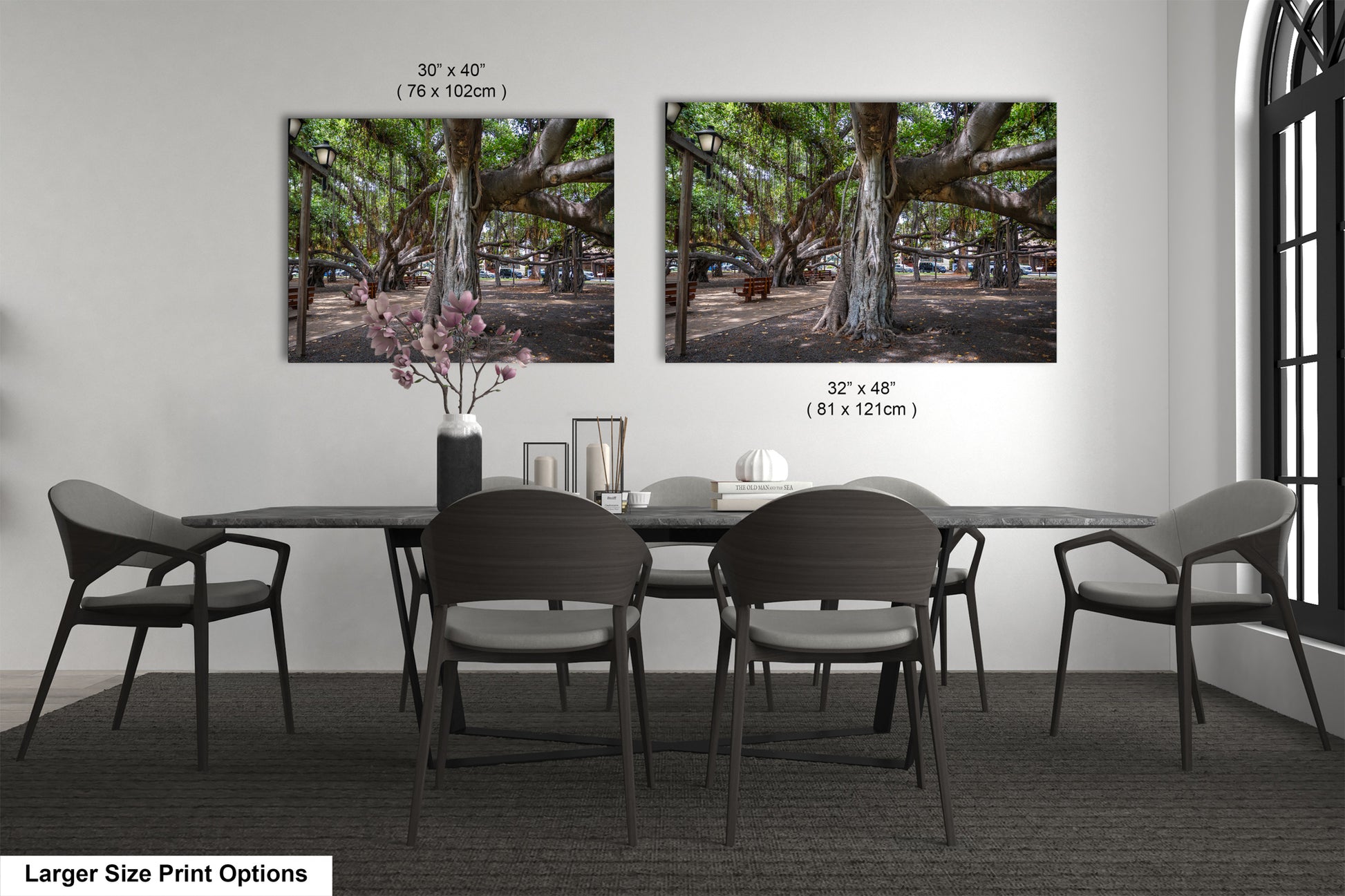 a dining room table with chairs and a vase of flowers