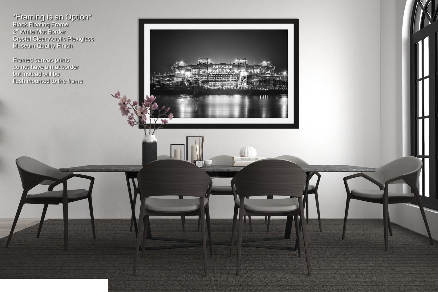 a black and white photo of a dining room