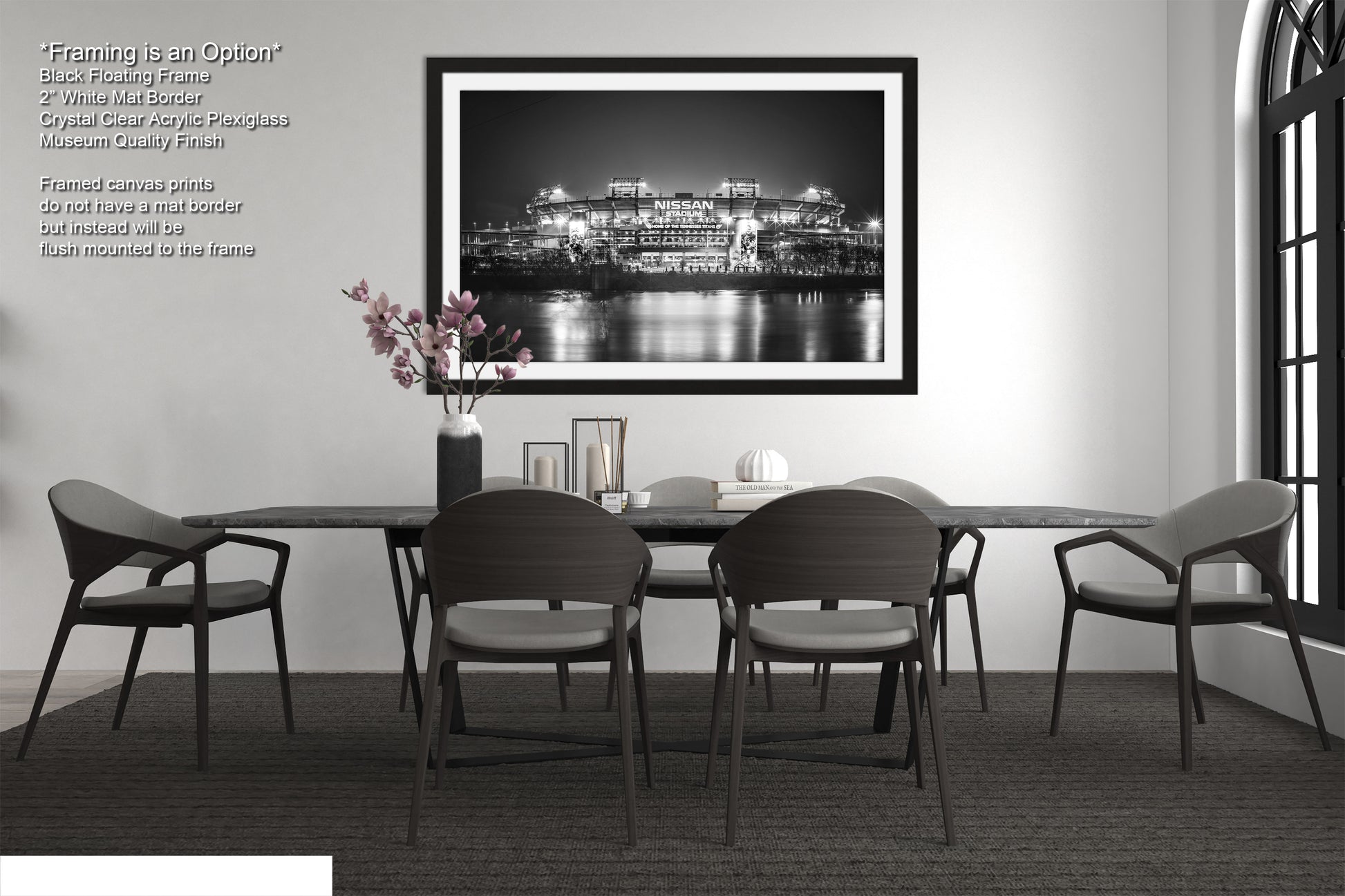 a black and white photo of a dining room