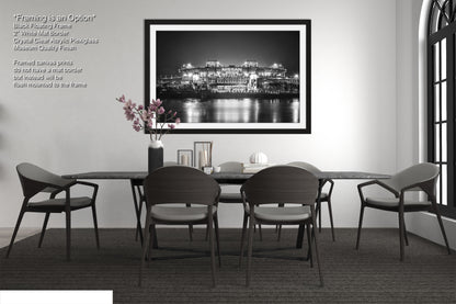a black and white photo of a dining room