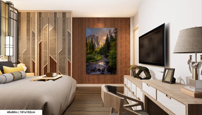 a bedroom with a bed, desk and television