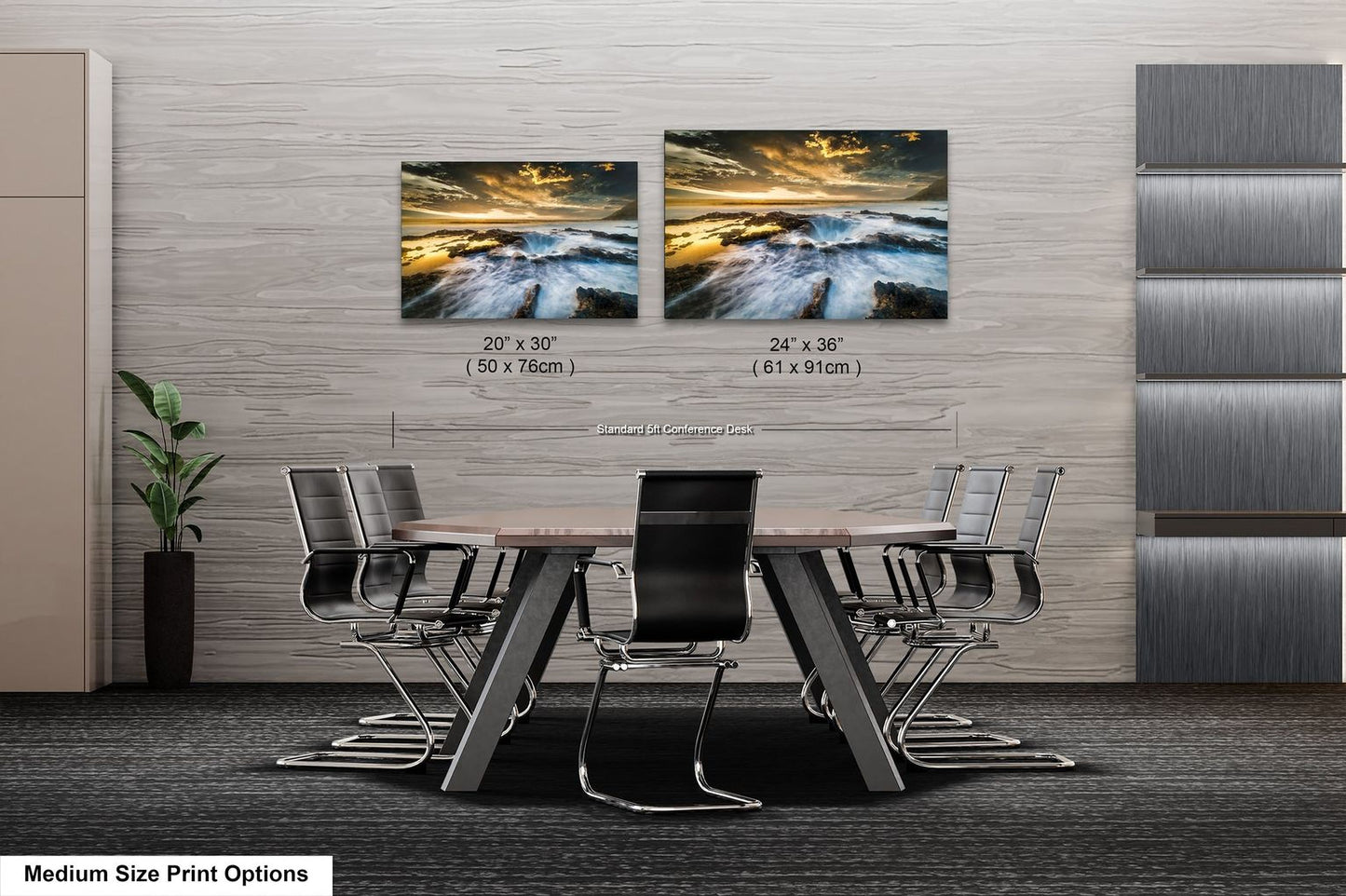 a dining room table with four chairs and two pictures on the wall