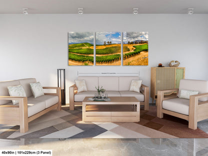 a living room filled with furniture and a painting on the wall