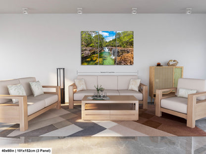 a living room filled with furniture and a painting on the wall