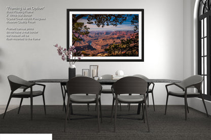 a picture of a dining room with a table and chairs