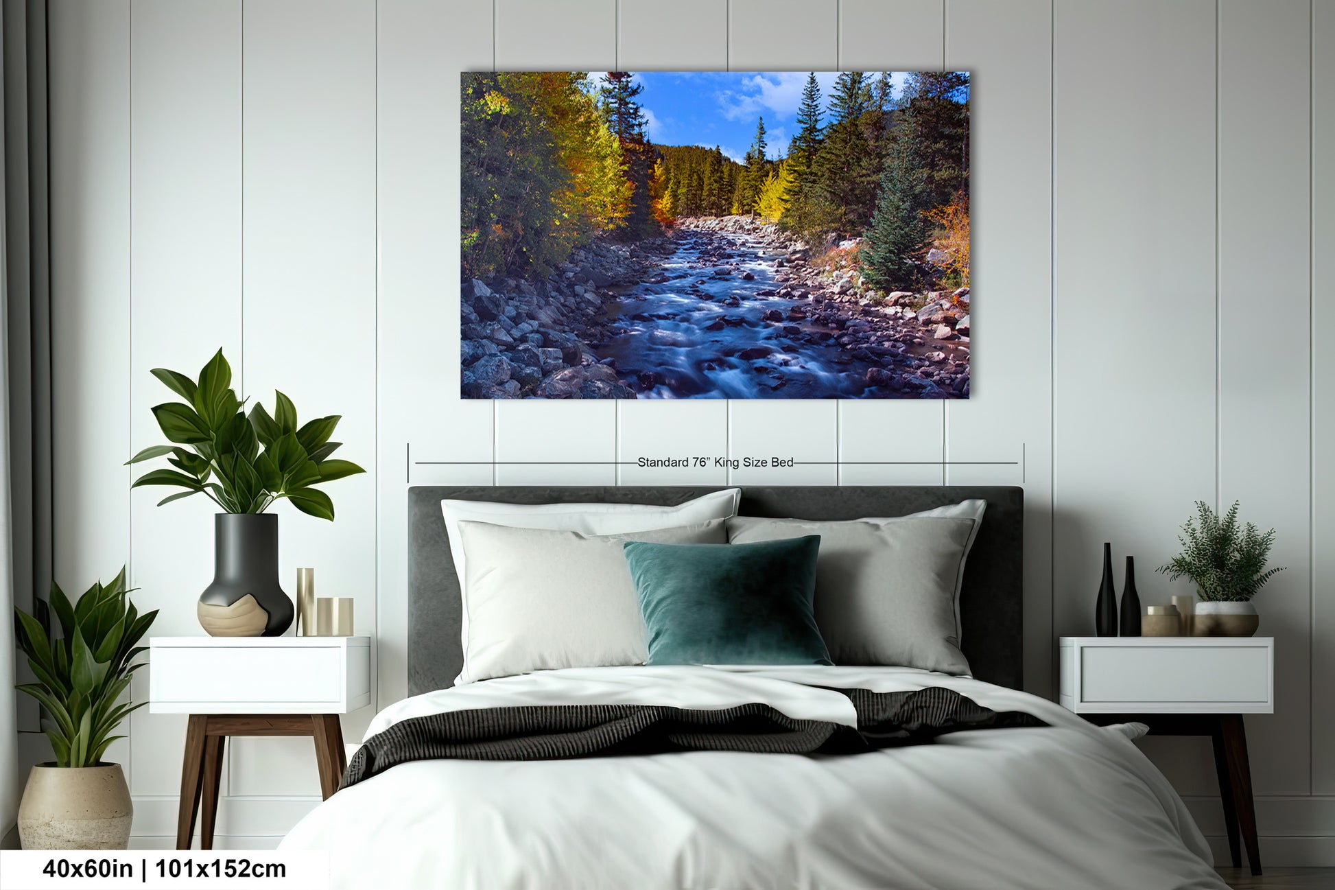 a bedroom with a bed and a painting on the wall