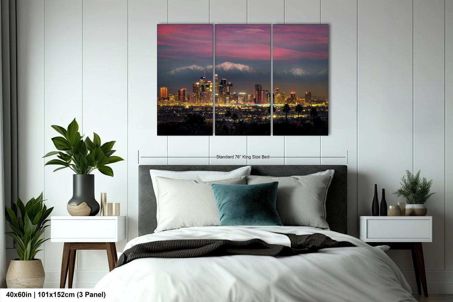 a bedroom with a bed and a picture of a city