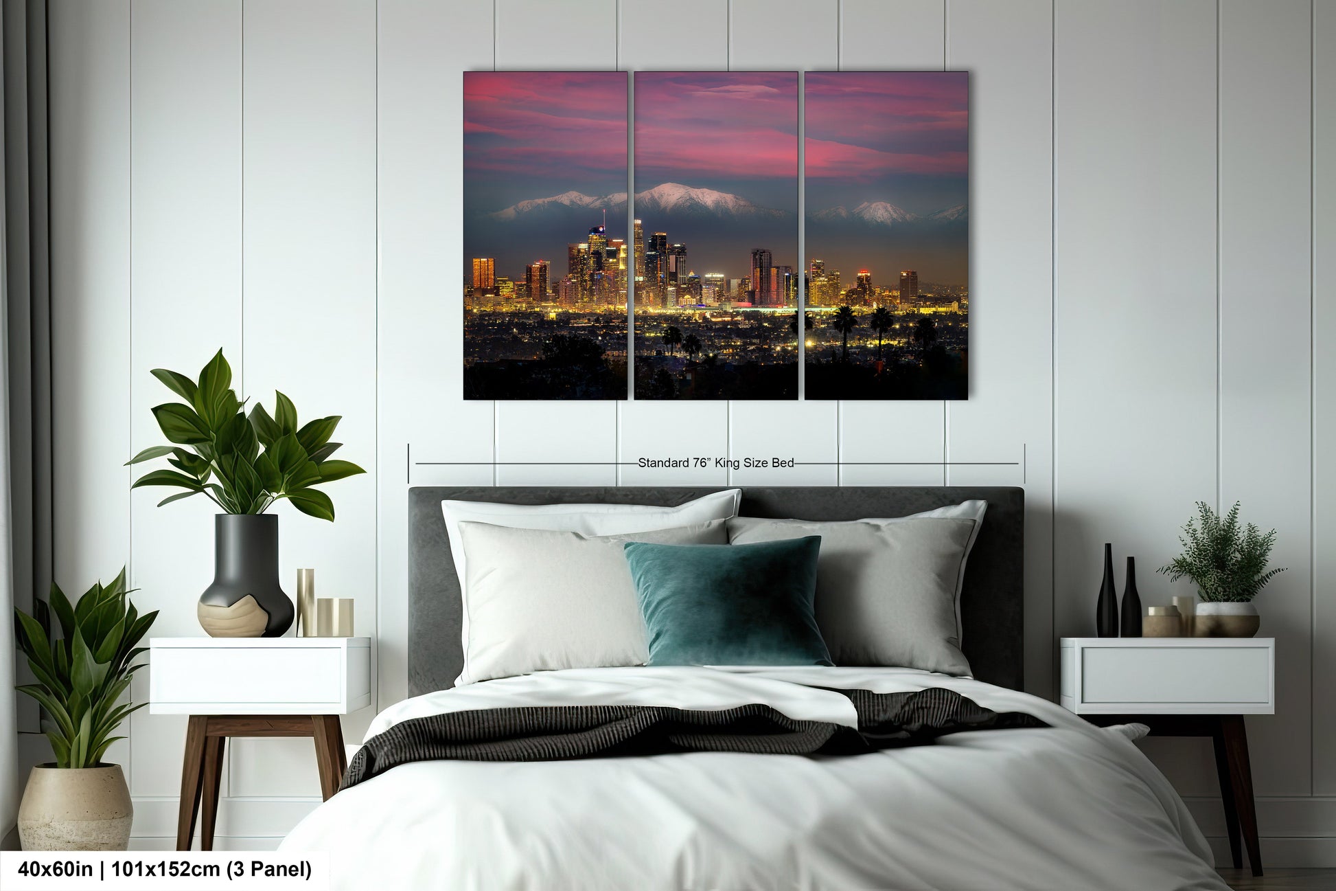 a bedroom with a bed and a picture of a city