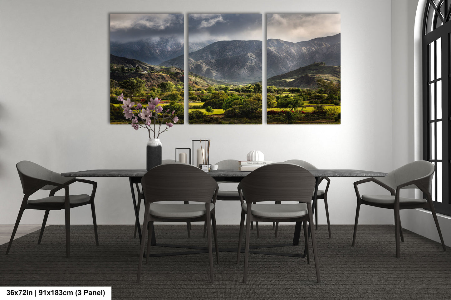 a dining room with a table and chairs