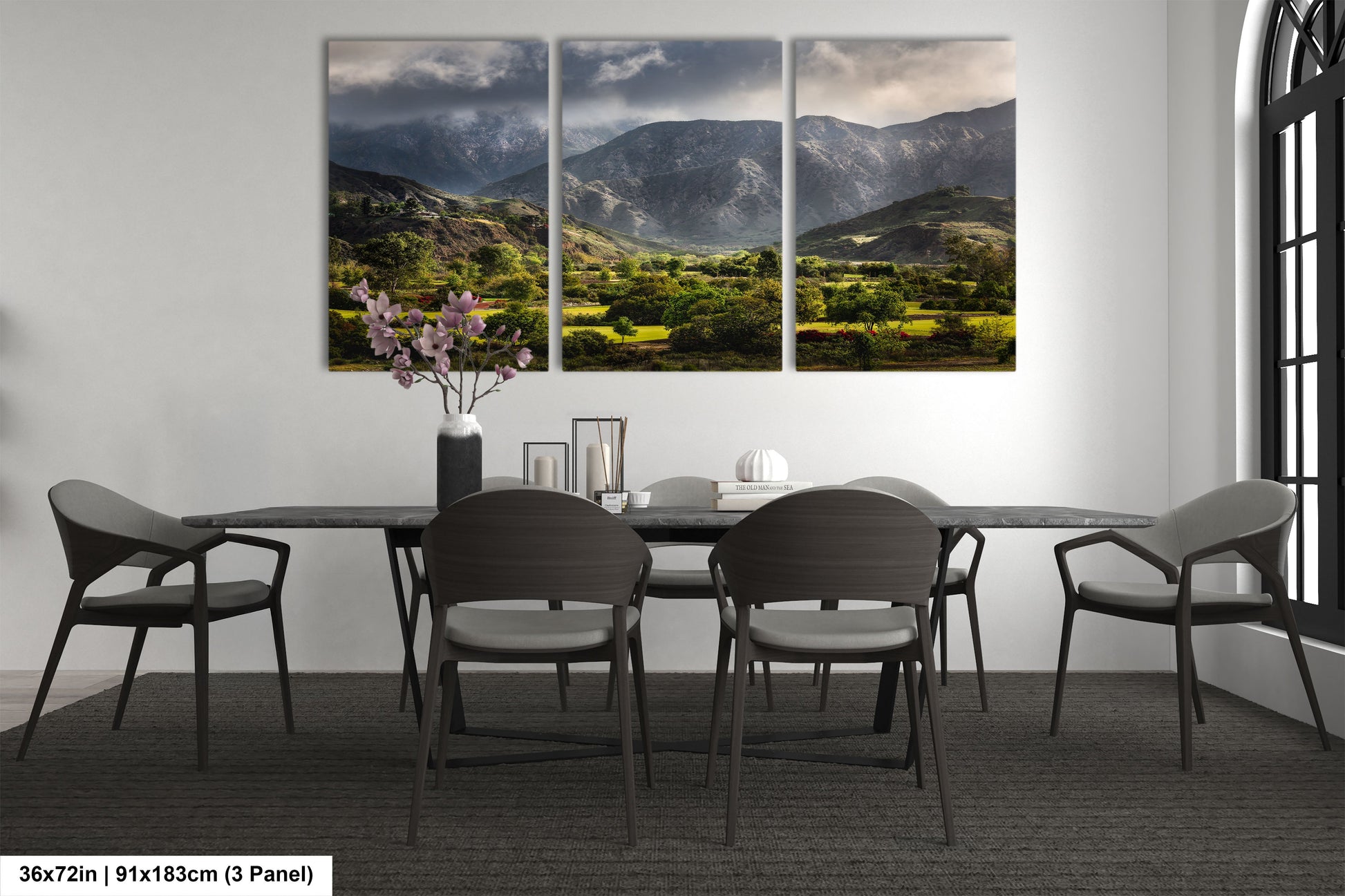 a dining room with a table and chairs