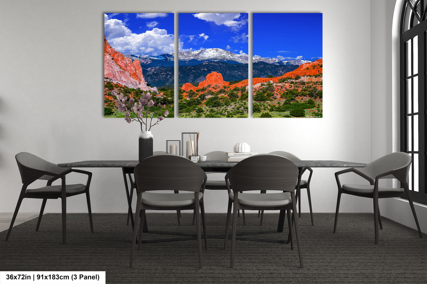 a dining room with a table and chairs