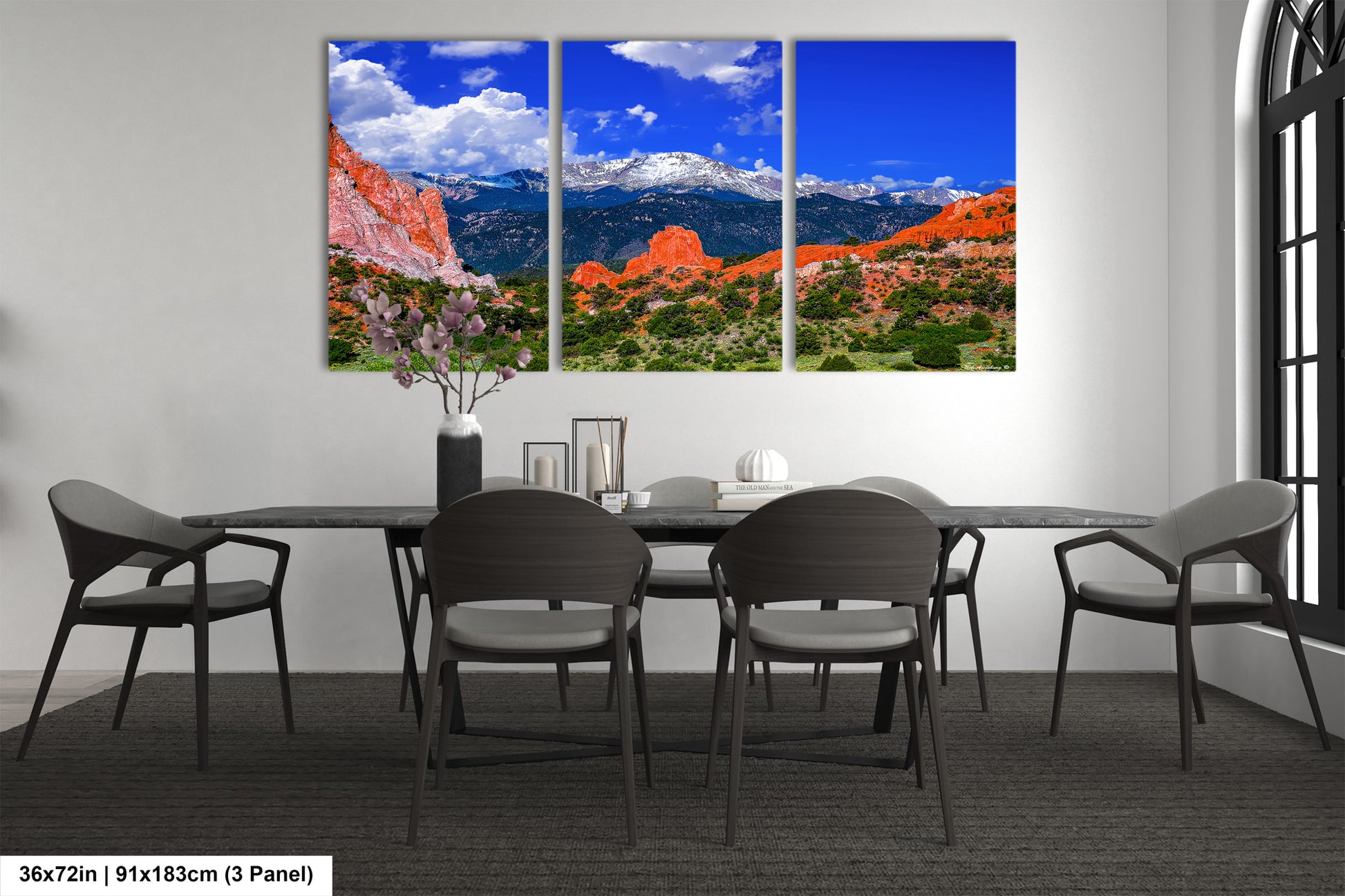 a dining room with a table and chairs