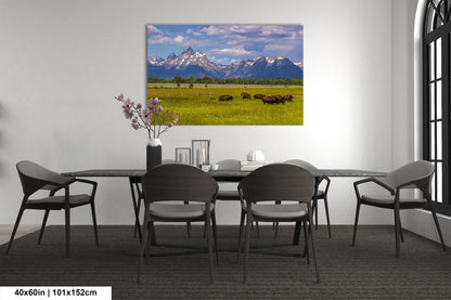 a dining room table with chairs and a painting on the wall