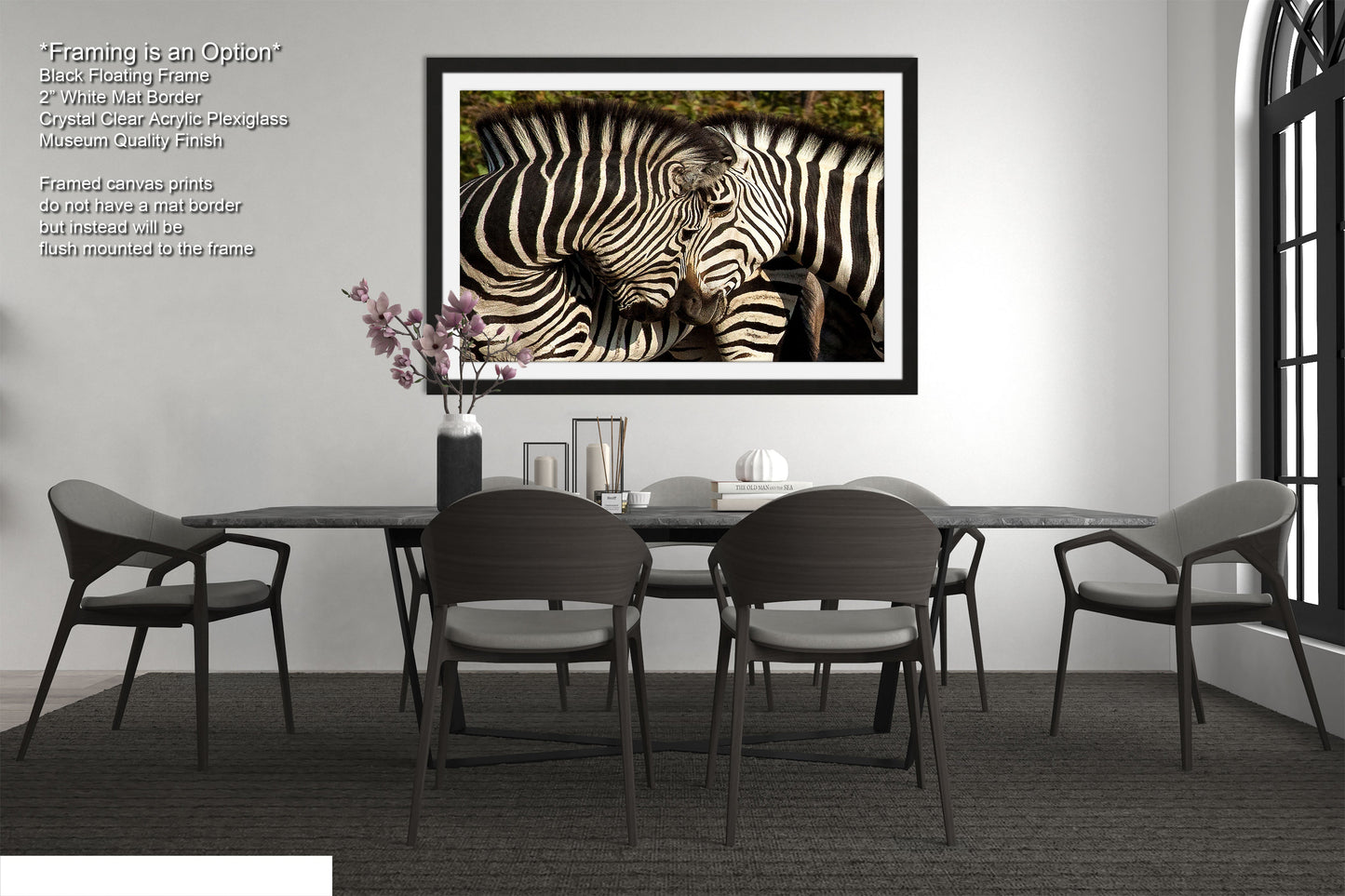 a couple of zebra standing next to each other