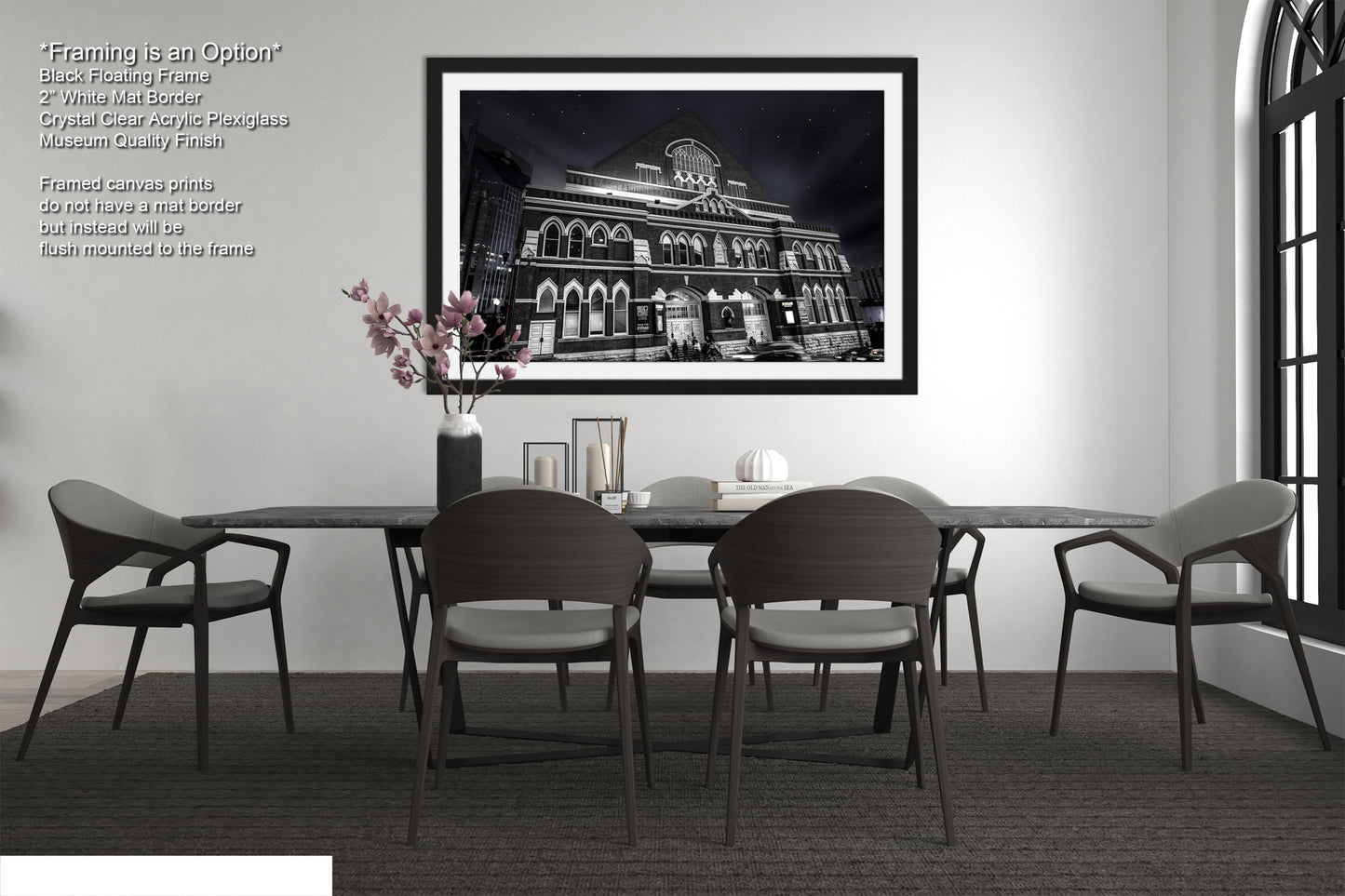 a black and white photo of a dining room