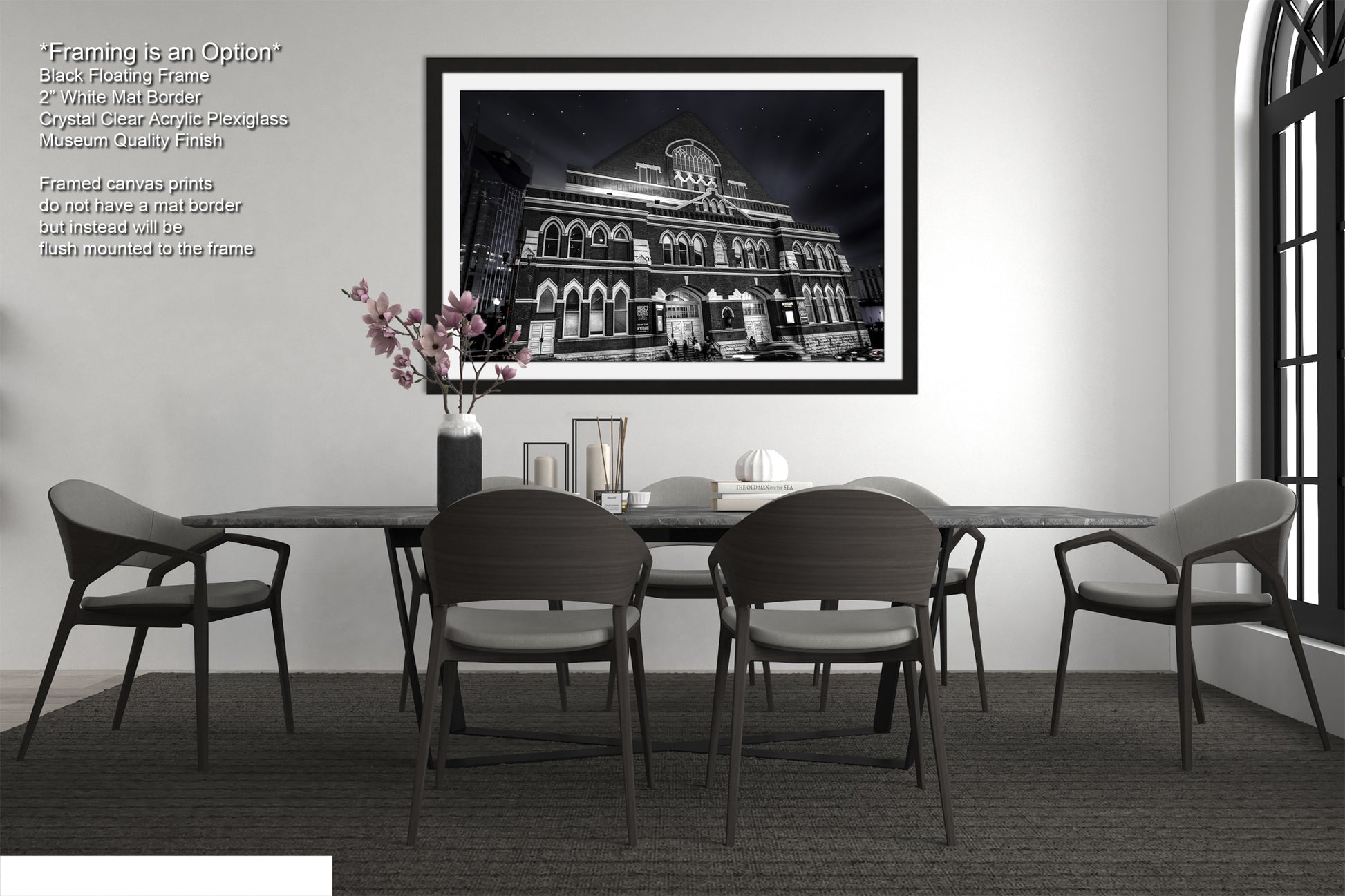 a black and white photo of a dining room