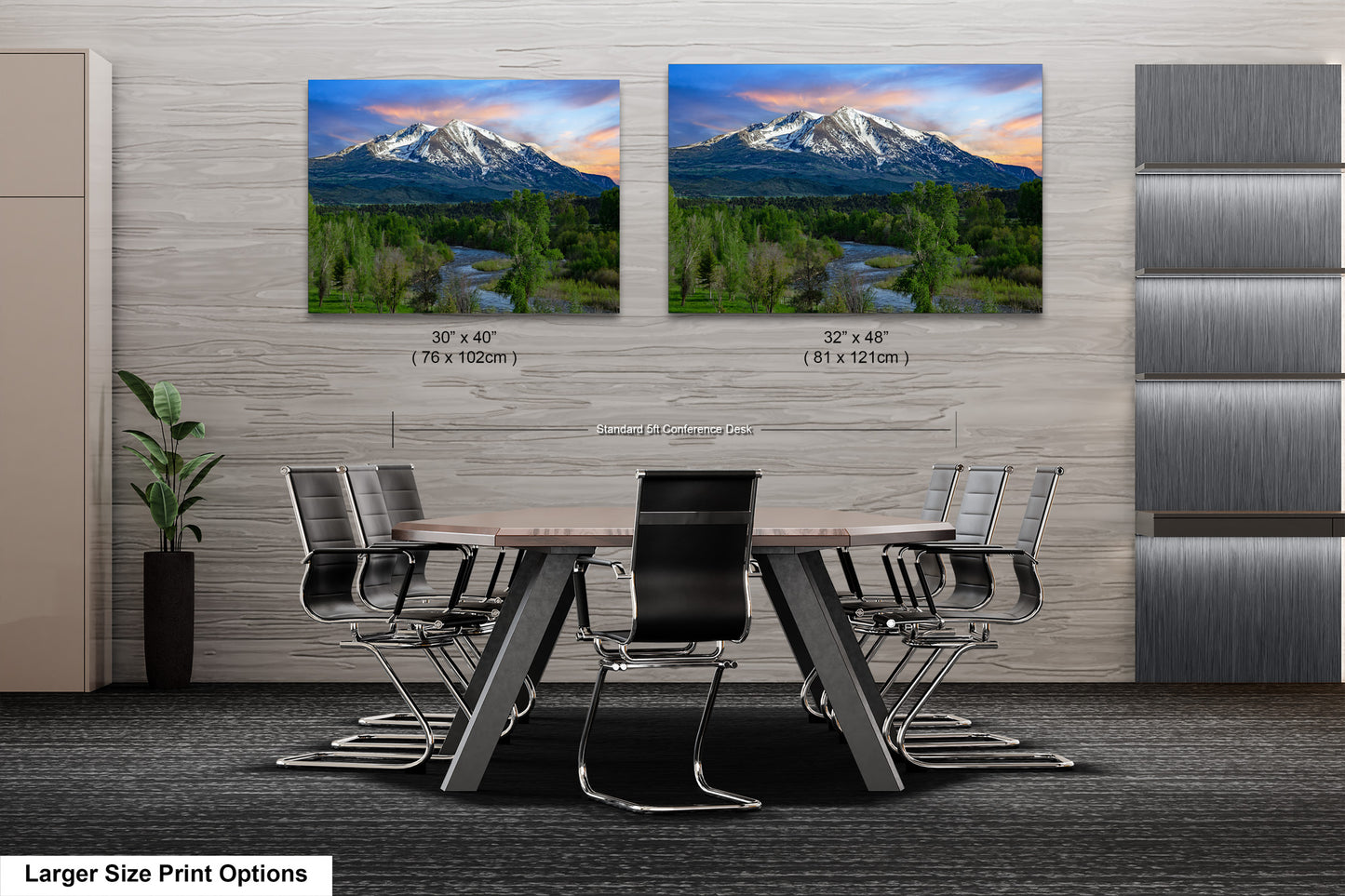 a dining room table with chairs and two pictures of a mountain