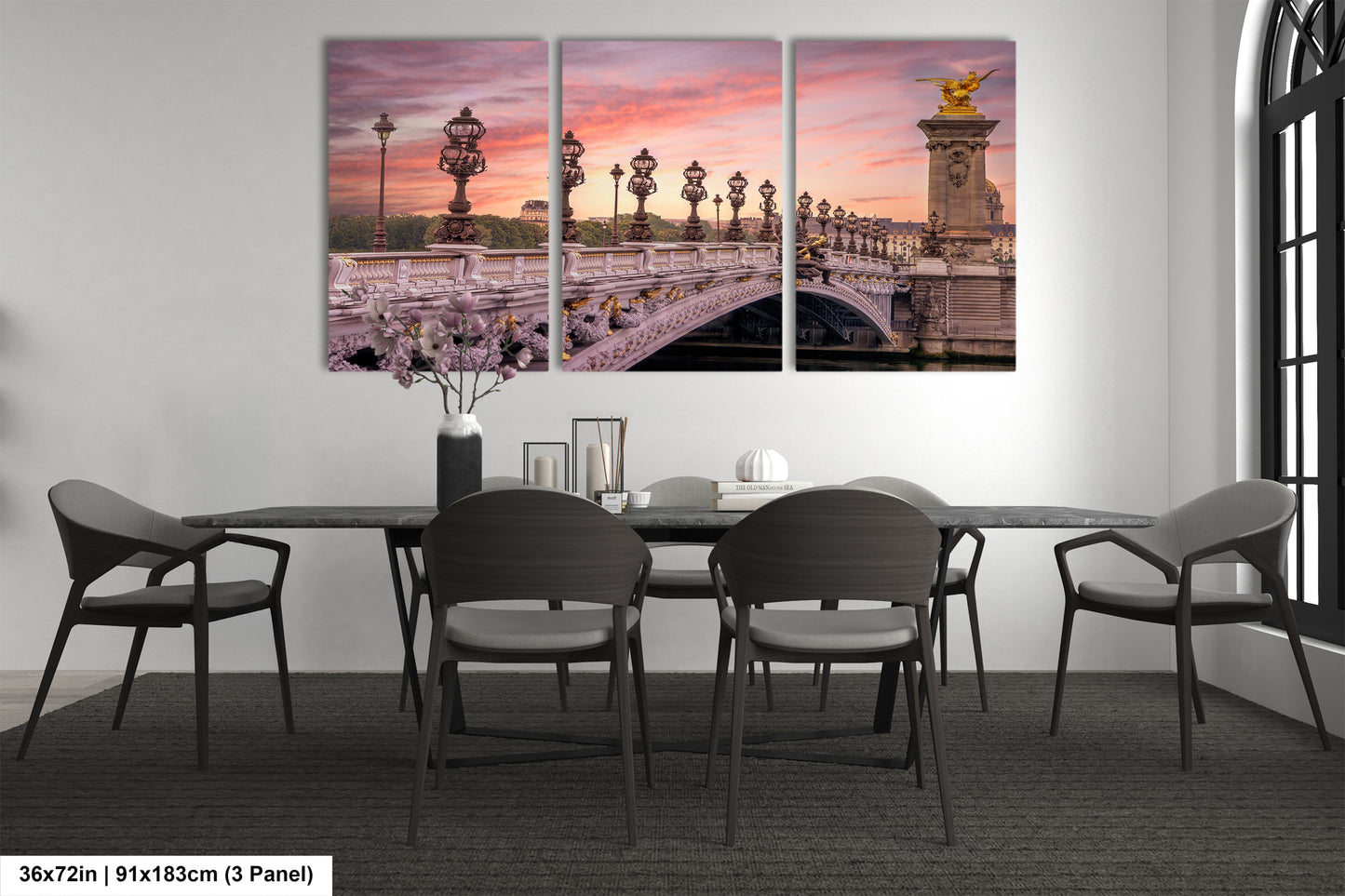 a dining room with a table and chairs