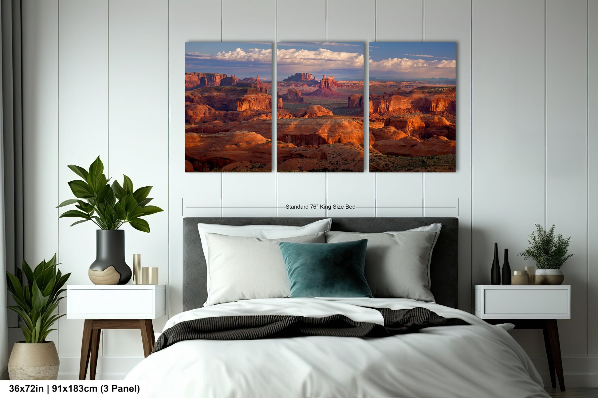 a bed room with a neatly made bed and three pictures on the wall