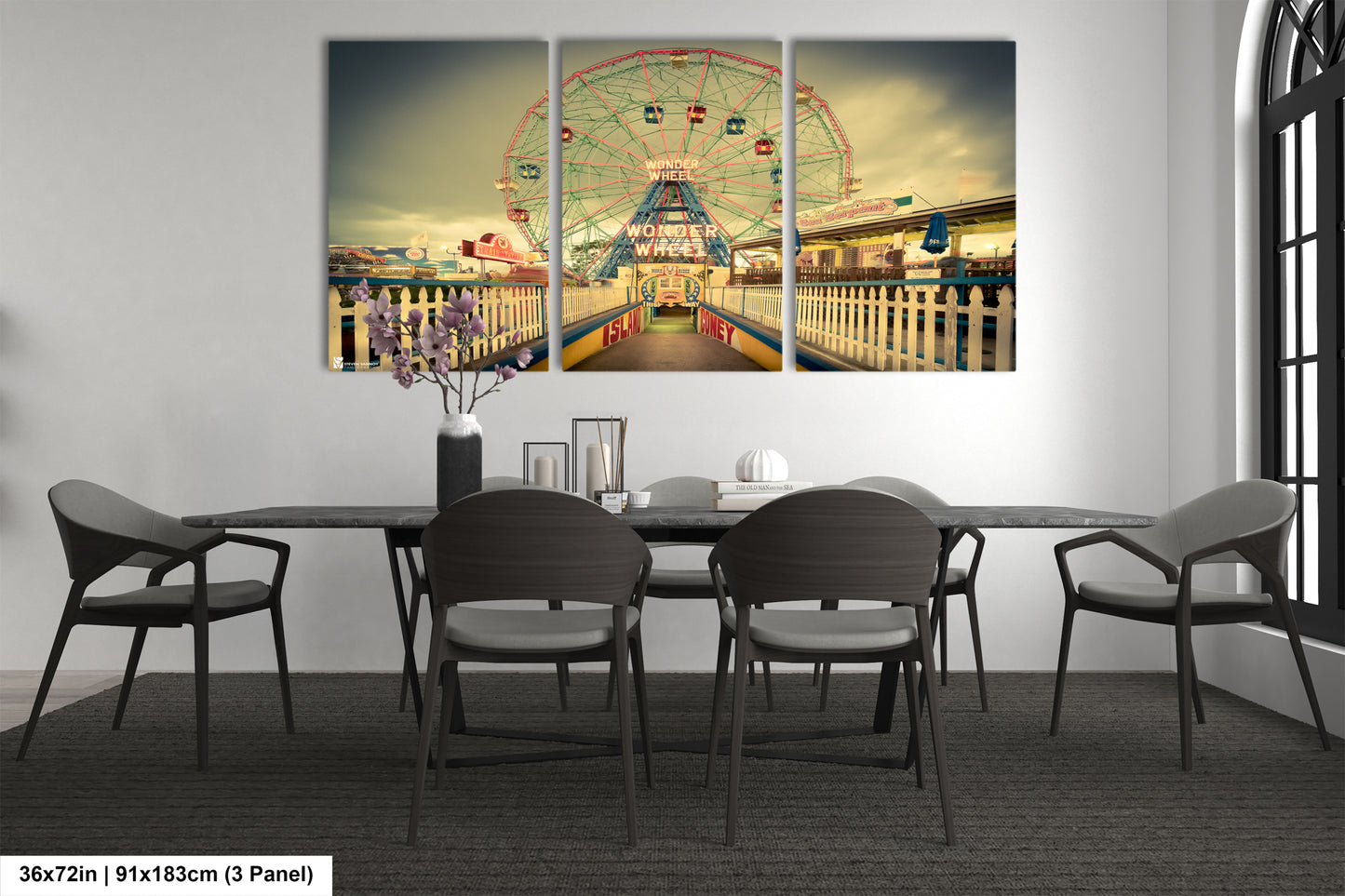 a dining room table with a ferris wheel in the background
