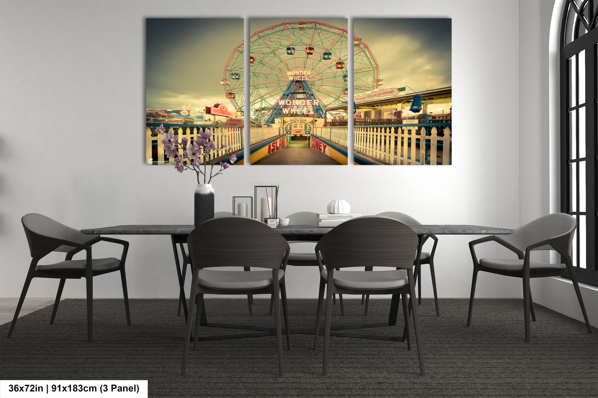 a dining room table with a ferris wheel in the background