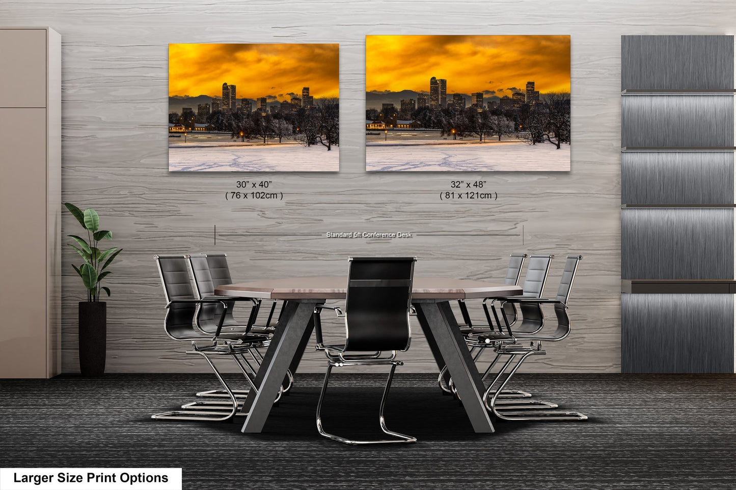 a dining room table with chairs and two pictures on the wall