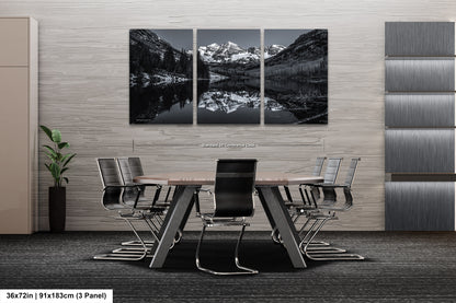 a dining room with a table and chairs